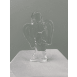 Clear glass angel figurine on a white cloth-covered surface