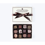 Box of assorted chocolates with a ribbon-tied lid