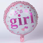Pink foil balloon with the words "it's a girl" and heart patterns