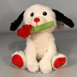 Plush dog holding a red rose
