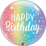 Rainbow birthday balloon with white text and confetti dots