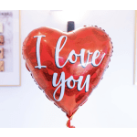 Red heart-shaped balloon with the words "I love you"