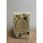 Memorial card with white flowers and a sympathy message