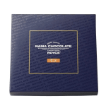Square navy box of Royce Nama chocolate with gold border and white text on the lid.