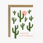 Birthday card with green cactus shapes and pink text