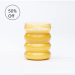 Yellow ribbed glass candle holder with a 50% off badge