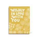 Yellow greeting card with white floral line art and the words "WILDLY IN LOVE WITH YOU"