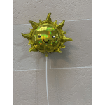 Gold sun-shaped balloon with a smiling face on a white stick