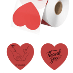 Rolls of heart-printed wrapping paper in red and white