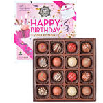 Box of assorted chocolates with a pink happy birthday gift box behind it
