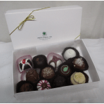 Box of assorted chocolate truffles in paper cups