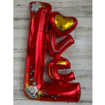 Red foil balloon shaped like the letter L with floral accents and a gold heart