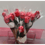 Bouquet of red foil-wrapped roses in clear plastic sleeves
