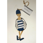 Wooden hanging ornament of a striped swimmer figure with life preserver and twine loop.