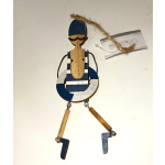 Wooden hanging ornament of a swimmer in a blue and white striped suit with dangling legs.