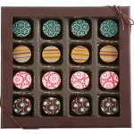 Box of assorted decorated chocolates in a brown gift box