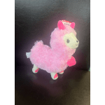 Pink plush llama toy with a cream face and bright pink accents
