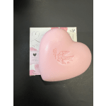 Pink heart-shaped soap on a decorative box