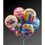 Cluster of colorful birthday balloons with printed messages