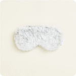 White fluffy faux fur item on a light background