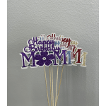Glittery birthday cake toppers with "Happy Birthday" and "Mom"