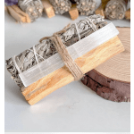 Bundle of dried sage tied with twine and a wooden holder