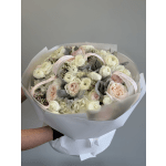 Bouquet of pale pink and white roses with ribbon accents