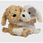 Two plush dog toys sitting together on a white background