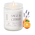 White jar candle labeled Sage & Citrus with orange slices and lavender sprigs
