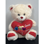 White teddy bear holding a red heart with "love you" text
