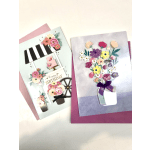 Two handmade floral greeting cards with paper flower bouquets