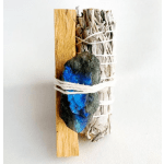 Smudge stick bundle with a blue crystal and wooden stick