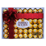 Large box of gold-wrapped chocolates with a red ribbon and bow across the front