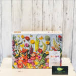 Gift box with a colorful flower collage and a Lakeview Floral & Gift card