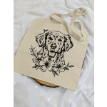 Canvas tote bag with a dog illustration and floral print