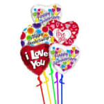 Cluster of heart-shaped anniversary and love balloons