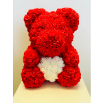 Red rose teddy bear with a white heart on its chest