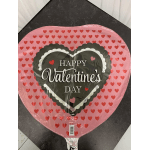 Heart-shaped Valentine's Day balloon with pink and red hearts