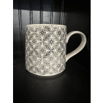 Patterned ceramic mug with a large handle