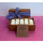 Boxed shower steamers with a blue ribbon and label
