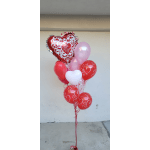 Heart-shaped Valentine balloon bouquet in red, pink, and white
