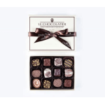 Box of assorted chocolates with a ribbon bow