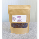 Kraft pouch of lavender tea with a clear window showing dried lavender buds