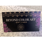 A Beyond Color Art gift card on patterned fabric