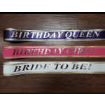 Three decorative sash ribbons reading Birthday Queen, Birthday Girl, and Bride to Be.