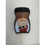 Glittery coffee cup sign with Spanish Mother's Day text on a stick