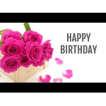 Pink roses in a wooden box beside "Happy Birthday" text
