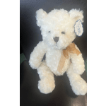 White teddy bear with a tan ribbon bow and hanging tag