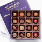 Box of assorted chocolates in a purple gift box