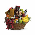 Fruit and chocolate gift basket with a red plaid bow